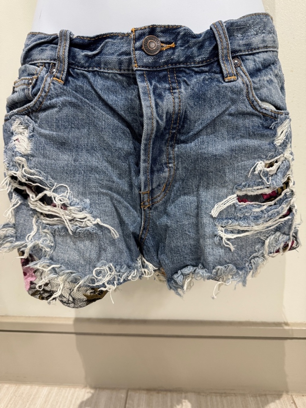 Free People Distressed Blue Denim Cutoff Shorts with Frayed Hem